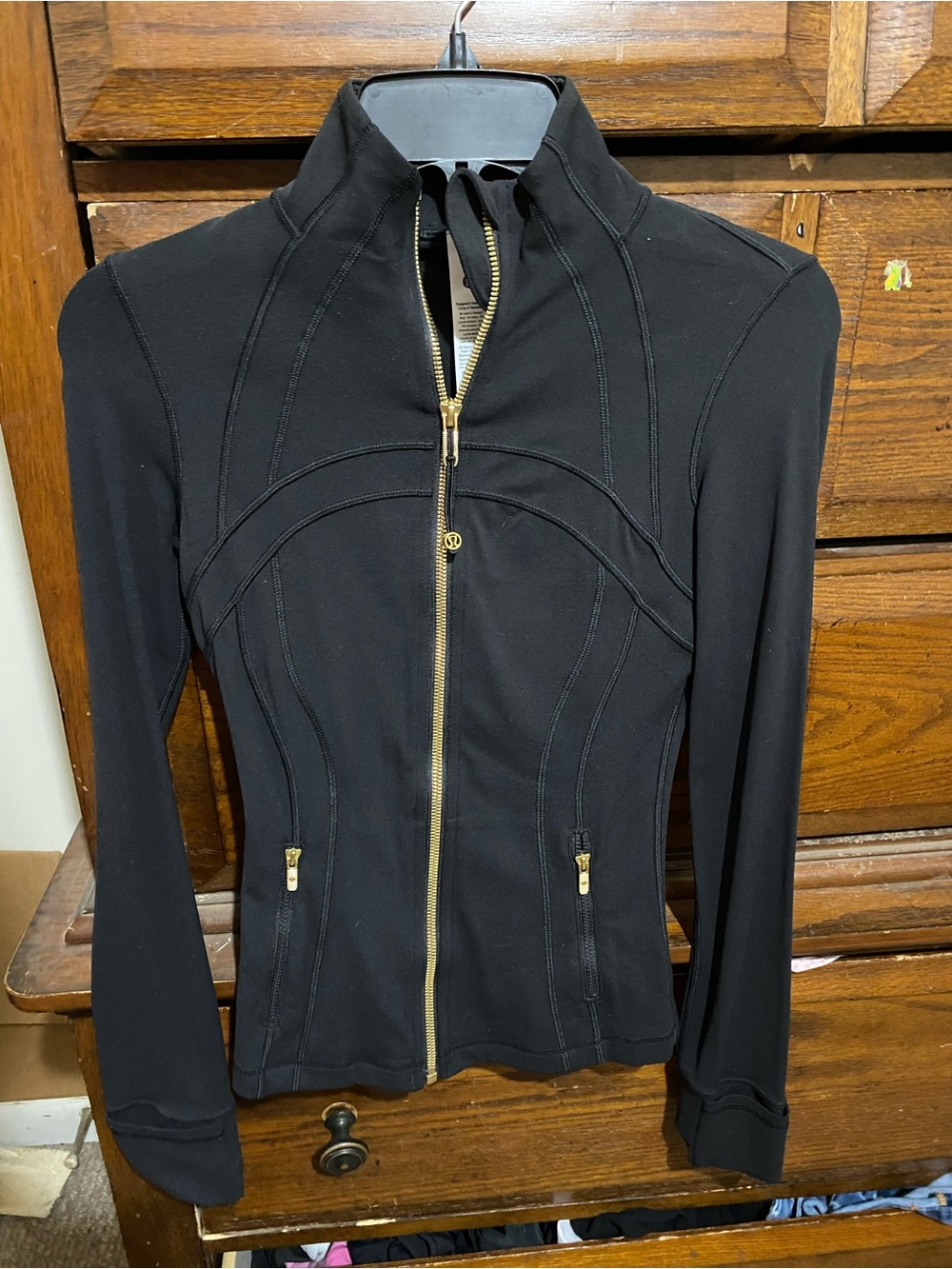 Lululemon black define jacket with gold zippers, discontinued in store